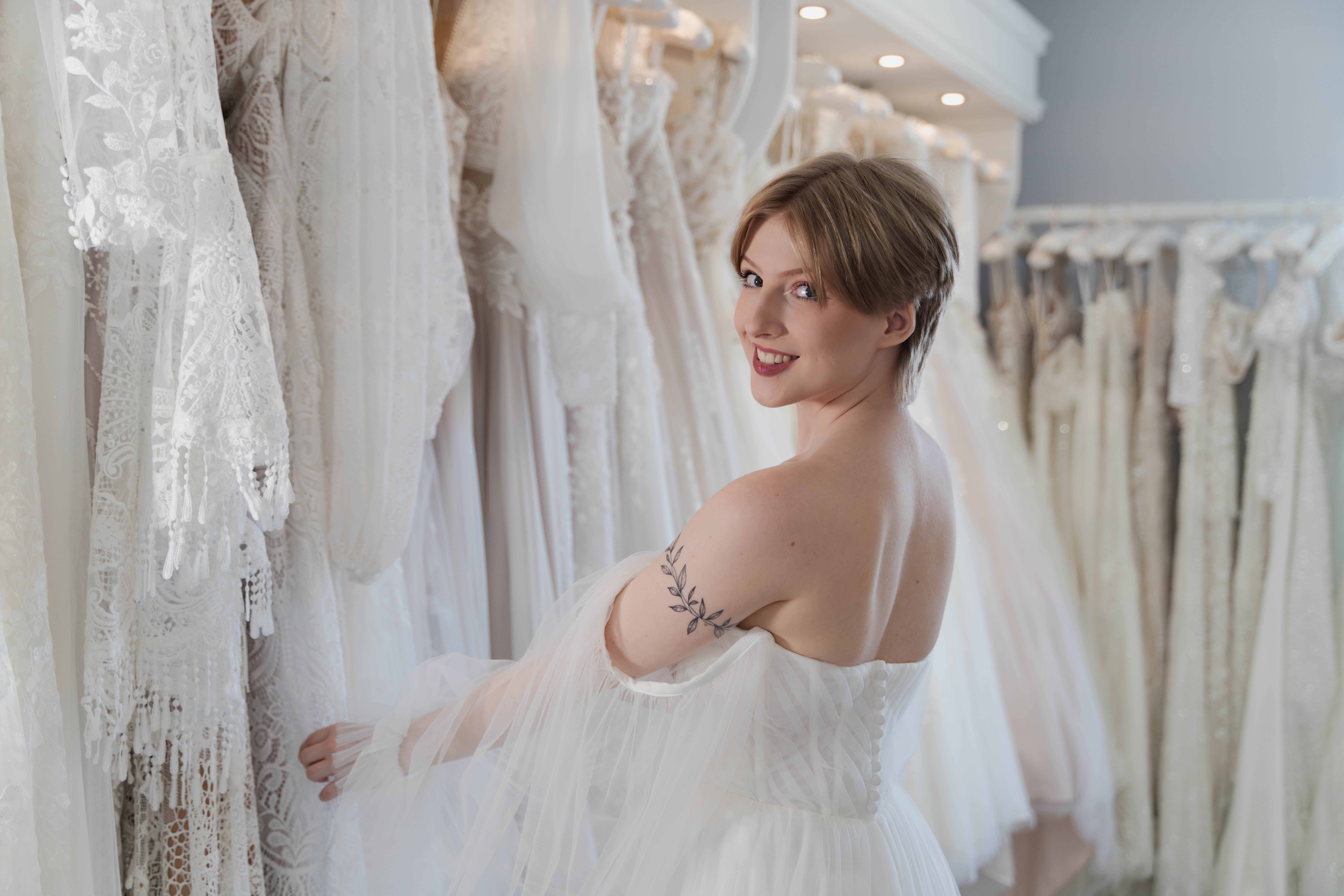 A bride choosing a wedding dress